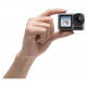 Экшн-камера DJI OSMO Action, в руке